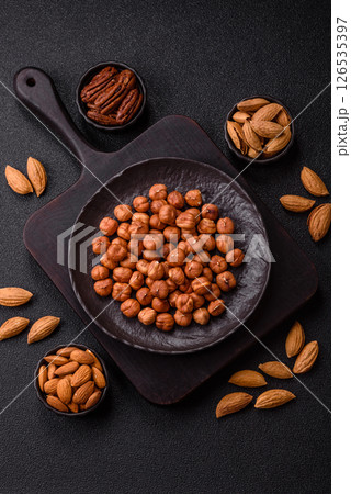 Raw hazelnuts without shells in a bowl Raw hazelnuts without shells in a bowl 126535397