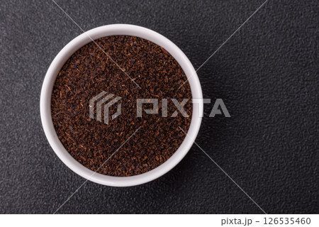 Black tea dry crushed in bowl Black tea dry crushed in bowl 126535460