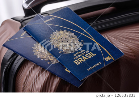International passport of a citizen of Brasil on a suitcase 126535833