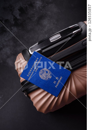 International passport of a citizen of North Korea on a suitcase 126535857