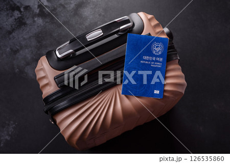 International passport of a citizen of South Korea on a suitcase 126535860