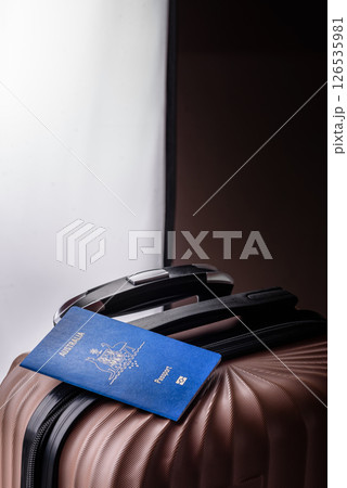 International passport of a citizen of Australia on a suitcase International passport of a citizen of Australia on a suitcase 126535981