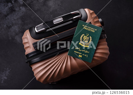 International passport of a citizen of Pakistan on a suitcase 126536015