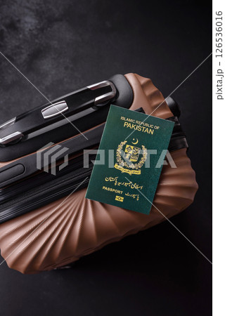 International passport of a citizen of Pakistan on a suitcase 126536016