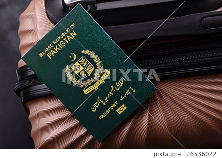 International passport of a citizen of Pakistan on a suitcase 126536022