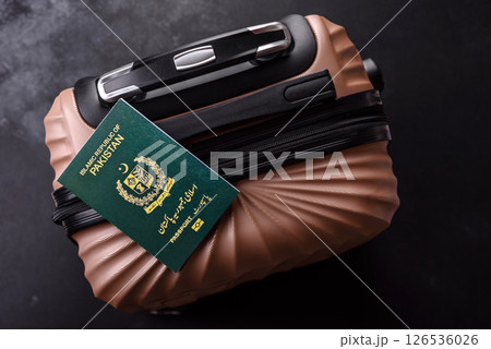 International passport of a citizen of Pakistan on a suitcase 126536026