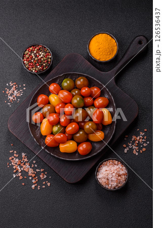 Tomatoes of different colors as a vegetable meal 126536437