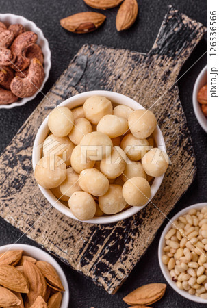 Raw peeled macadamia nut in ceramic bowl Raw peeled macadamia nut in ceramic bowl 126536566