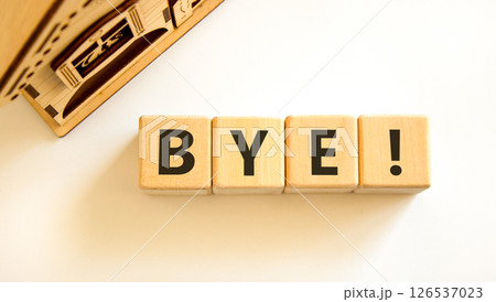 Bye symbol. Concept word Bye on beautiful wooden blocks. Beautiful wooden house. Beautiful white table white background. Business and bye concept. Copy space. Bye symbol. Concept word Bye on beautiful wooden blocks. Beautiful wooden house. Beautiful white table white background. Business and bye concept. Copy space. 126537023