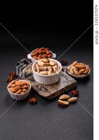 Brazil nut kernels in ceramic bowl 126537074