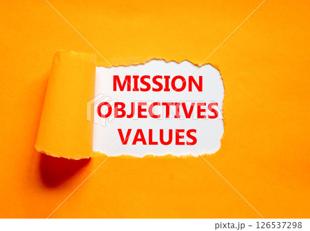 Mission objectives values symbol. Concept words Mission Objectives Values on beautiful white paper. Beautiful orange table orange background. Business mission objectives values concept. Copy space. Mission objectives values symbol. Concept words Mission Objectives Values on beautiful white paper. Beautiful orange table orange background. Business mission objectives values concept. Copy space. 126537298