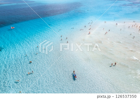 Aerial view of amazing sea coast. Top view of white sandy beach Aerial view of amazing sea coast. Top view of white sandy beach 126537350