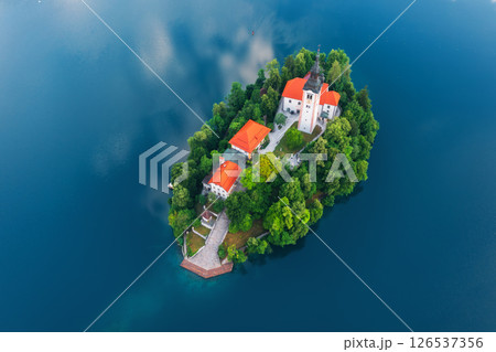 Aerial view of lake Bled with island with church, houses, trees Aerial view of lake Bled with island with church, houses, trees 126537356
