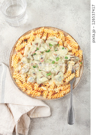 fusilli pasta, with champignons, in creamy garlic sauce, with herbs and spices, sauce, no people, 126537417
