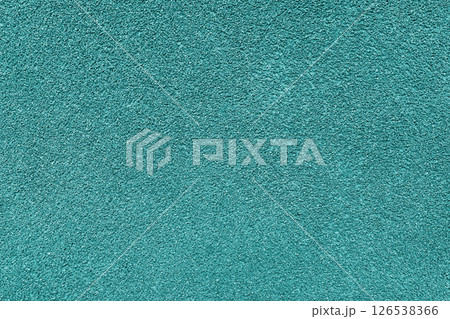 Grainy texture of turquoise colored asphalt, plaster, cement, plastic close up, macro background Grainy texture of turquoise colored asphalt, plaster, cement, plastic close up, macro background 126538366
