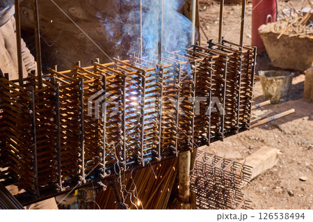 Welding Sparks Are Flying High as Metalwork Beautifully Takes Shape in the Workshop 126538494