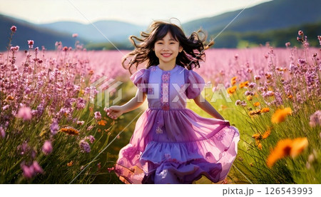 happy young woman in flower field 126543993
