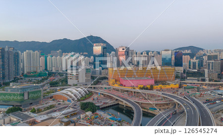 May 12 2025 Modern Urban Cityscape With Skyscrapers and Highways at Dusk 126545274