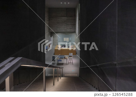 Modern Interior View With Staircase Leading to Reception March 28 2025 126545288