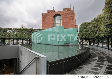 Modern Green Glass Memorial with Nature and Information Display March 28 2025 126545289