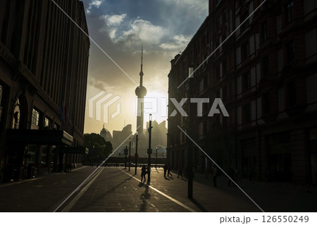 Silhouette people in East Nanjing and Pearl tower at sunrise, Shanghai Silhouette people in East Nanjing and Pearl tower at sunrise, Shanghai 126550249