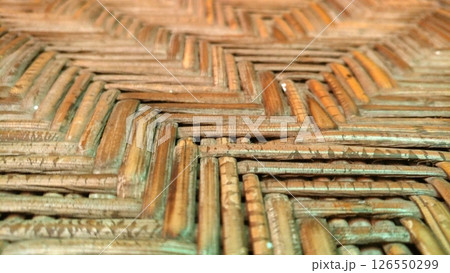 Intricate Rattan Weave Texture. 126550299
