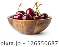 A wooden bowl filled with fresh, dark red cherries, each covered in water droplets, creating a visually appealing and appetizing image. 126550687