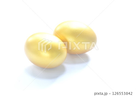 raw golden egg shell arranging on white background  126553842
