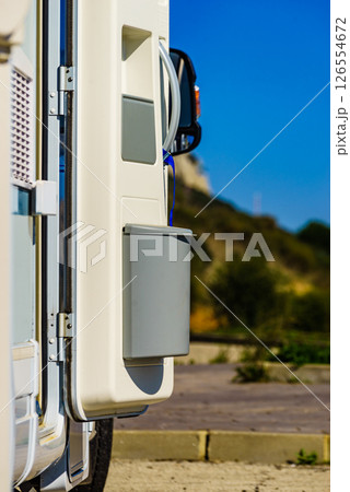 Camper door with trash can. Camper door with trash can. 126554672