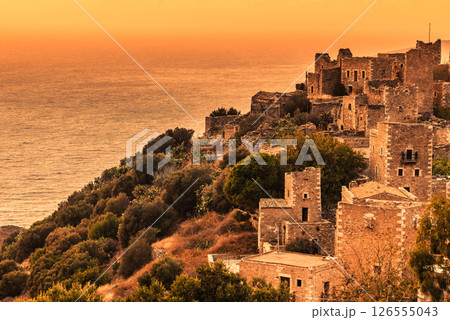 Tower houses in Vathia at sunset Greece Mani Peninsula Tower houses in Vathia at sunset Greece Mani Peninsula 126555043