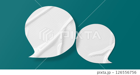 White speech bubble crumpled paper isolated on green background 126556756