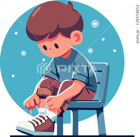 A boy is learning to tie his shoelaces. A boy is learning to tie his shoelaces. 126558652