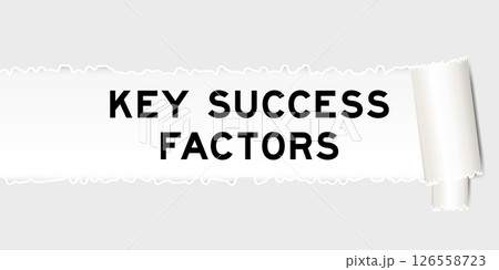 Ripped gray paper background that have word key success factor under torn part Ripped gray paper background that have word key success factor under torn part 126558723