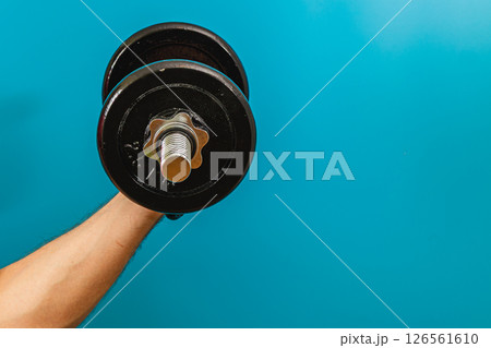 Medical professional examines patients fingers for health 126561610