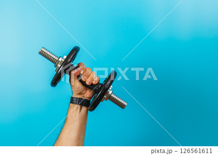 Medical professional examines patients fingers for health 126561611