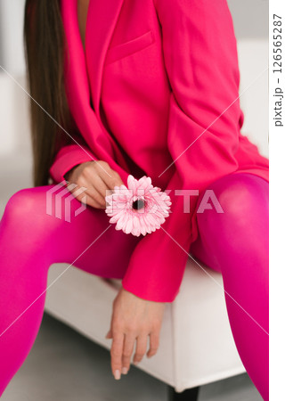 Pink Gerbera Held By Woman Pink Gerbera Held By Woman 126565287
