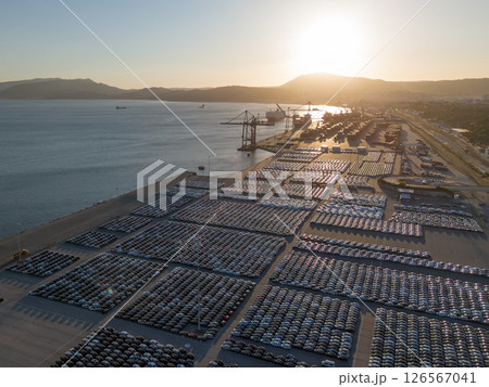 New Cars on Parking Lot in Port of Setubal, Portugal at Sunset. Aerial View New Cars on Parking Lot in Port of Setubal, Portugal at Sunset. Aerial View 126567041