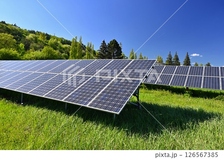 Technology solar cell. Solar panels on the sky background. Power plant. Alternative source of electricity. Solar farm. 126567385