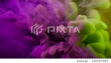Vapor mix. Ink wave. Purple green paint fluid spilling in liquid. Art blend color swirl explosion abstract flow defocused background. 126567863