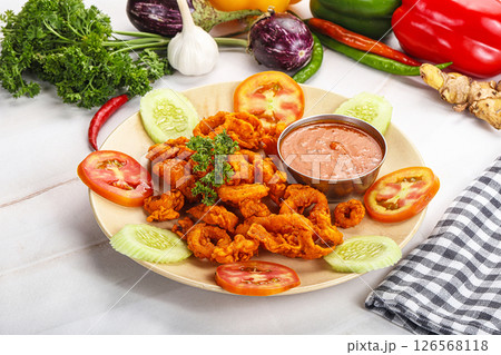 Golden fried crispy calamari with sauce Golden fried crispy calamari with sauce 126568118
