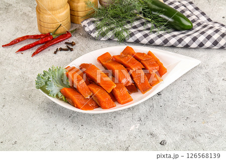 Red pickled herring fish fillet 126568139