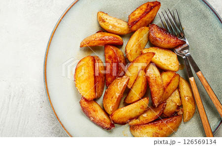 fried potato slices, on a plate, top view, homemade, no people, fried potato slices, on a plate, top view, homemade, no people, 126569134