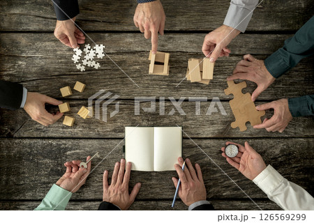 Eight businessmen planning a strategy in business advancement 126569299