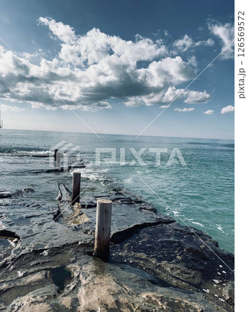 Beach, sunny day, sea, waves. Beach, sunny day, sea, waves. 126569572
