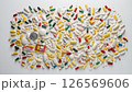 Top view: multi-colored pills, capsules and pills on a white background, pharmacy concept 126569606