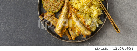 A healthy and flavorful breakfast with turmeric rice, ocean fish, broccoli pancakes, and a roasted vegetable salad, perfect for fueling your day with protein and healthy fats, banner A healthy and flavorful breakfast with turmeric rice, ocean fish, broccoli pancakes, and a roasted vegetable salad, perfect for fueling your day with protein and healthy fats, banner 126569652