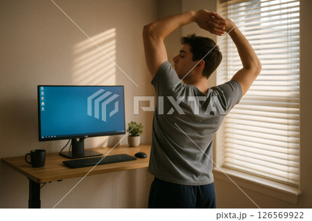 Back stretch near desk and light 126569922