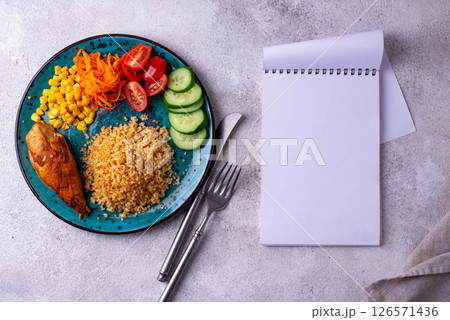 Healthybalanced food plate with chicken and vegetables 126571436