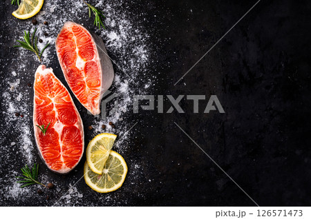 Raw uncooked salmon with rosemary 126571473