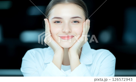 beautiful young woman in white coat 126572943